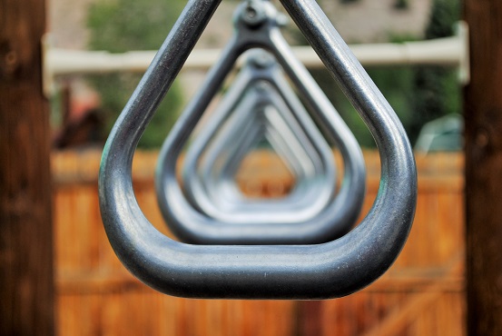 Link to resources for students and parents.  Image of playground hand-over-hand bars.